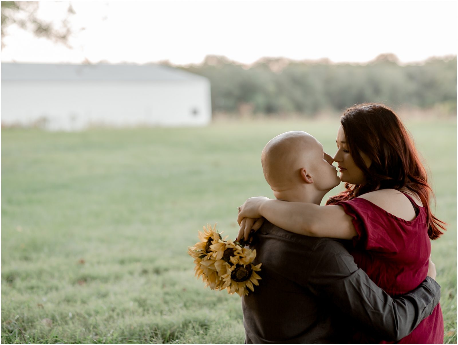 engagement session in sunflower field