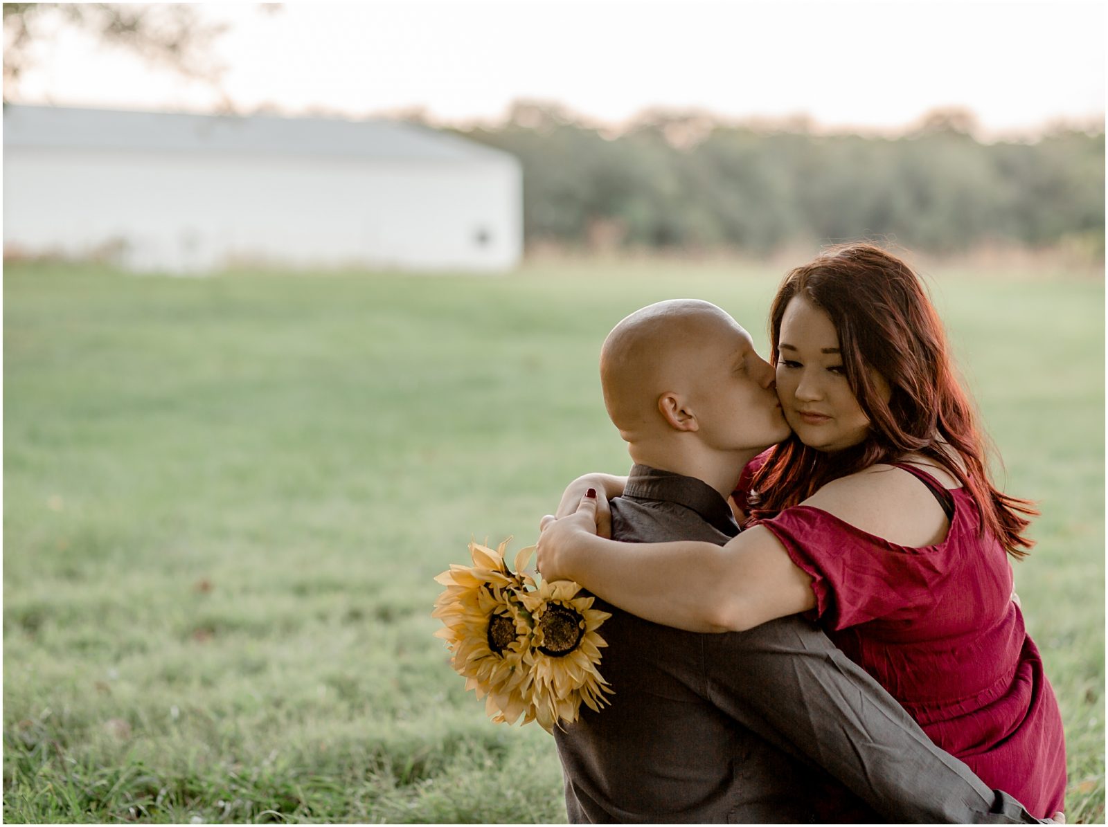 engagement session in sunflower field
