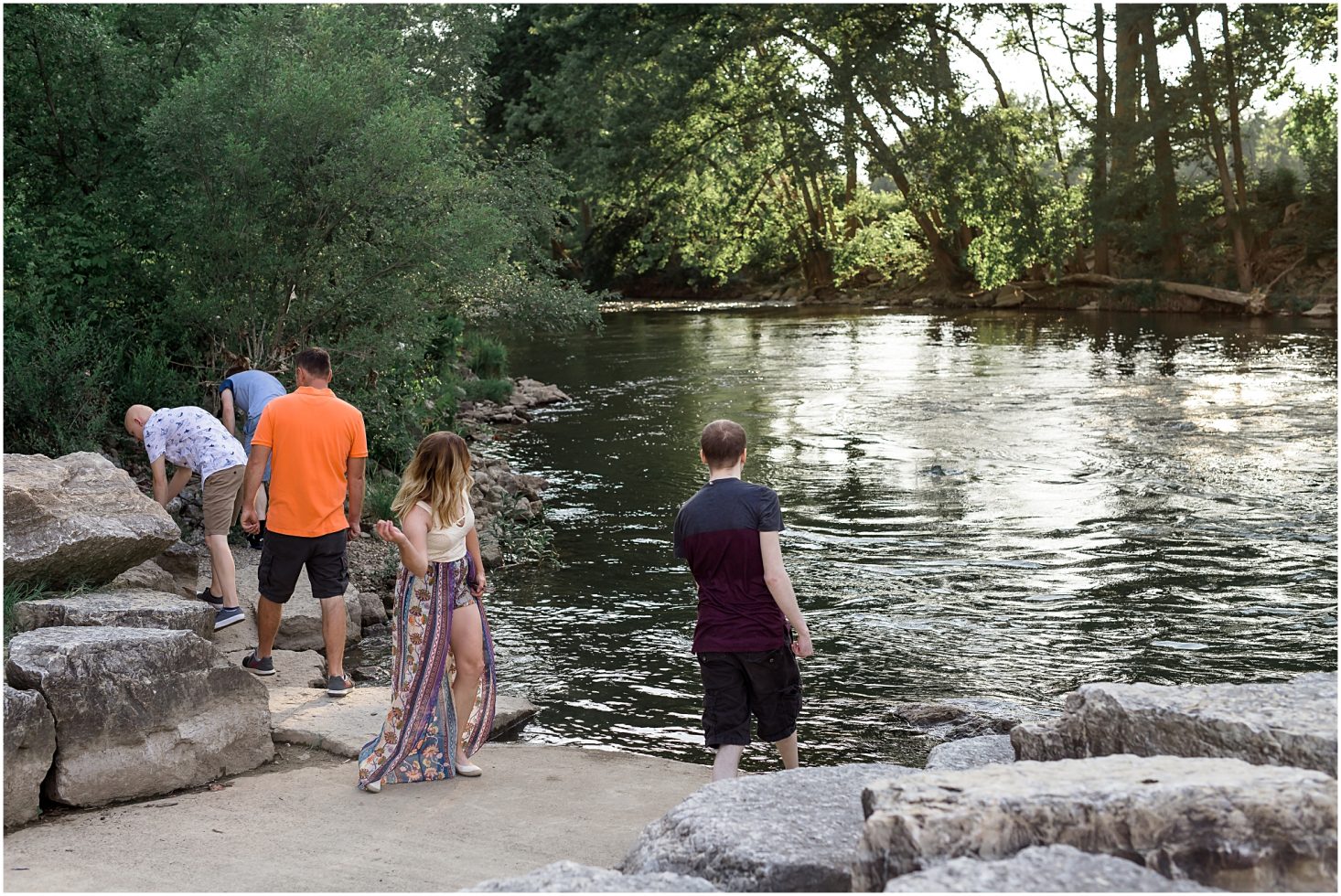 Family session by a creek