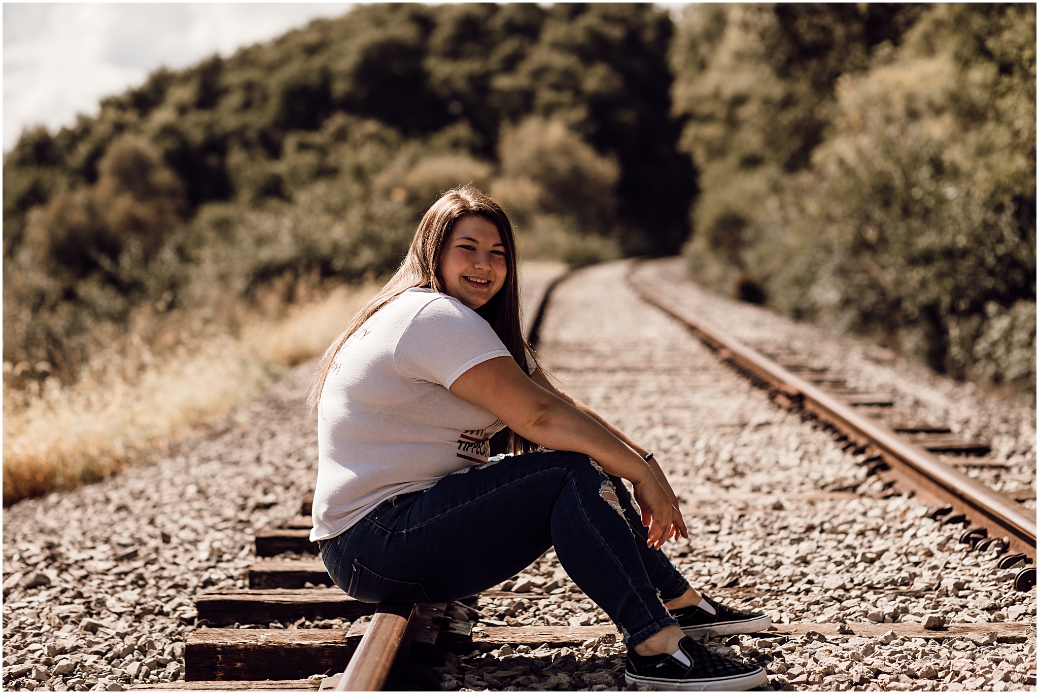 Senior session on railroad track